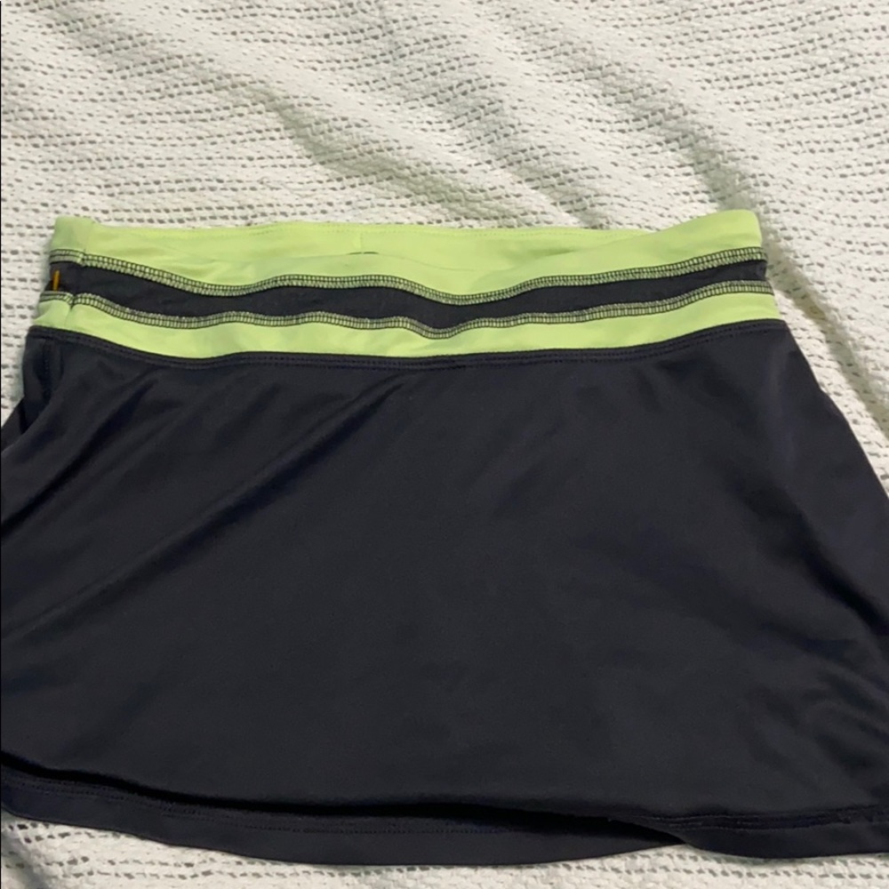 bright yellow and black skort
